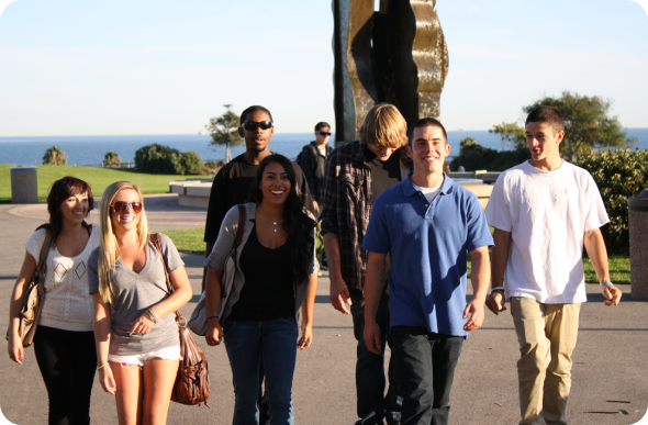 a group of international university students spending time together on the US coast to help unwind from their work